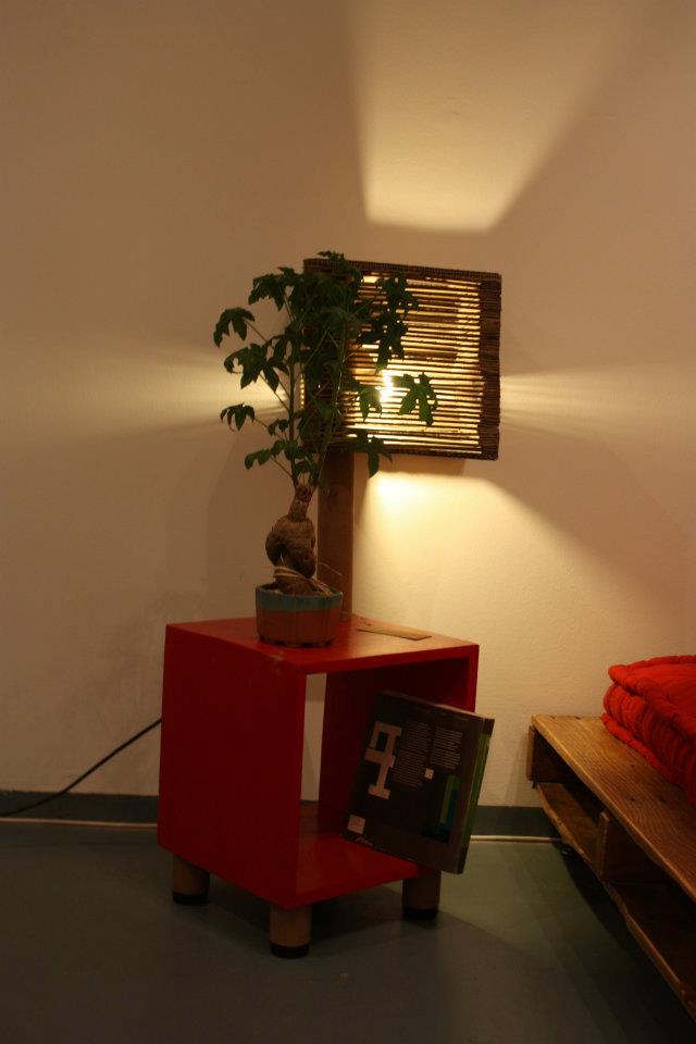 Lamp made from cardbaord and a cardboard tube with a side table made from reclaimed pallet wood